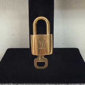 Louis Vuitton Gold Padlock with key #319